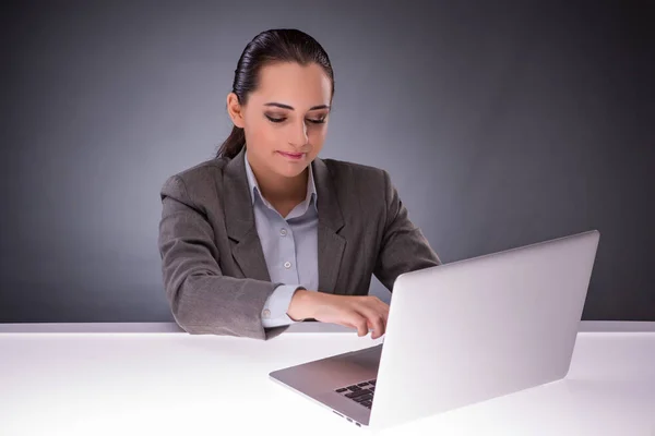 Businesswoman with laptop in business concept — Stock Photo, Image