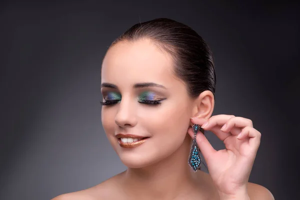 Beautiful woman showing off her jewellery in fashion concept — Stock Photo, Image