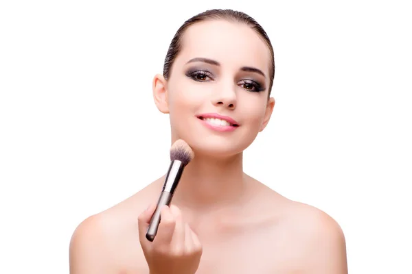 Ung kvinna under make-up session isolerad på vit — Stockfoto