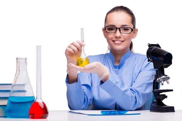 Lab chemist working with microscope and tubes Stock Picture