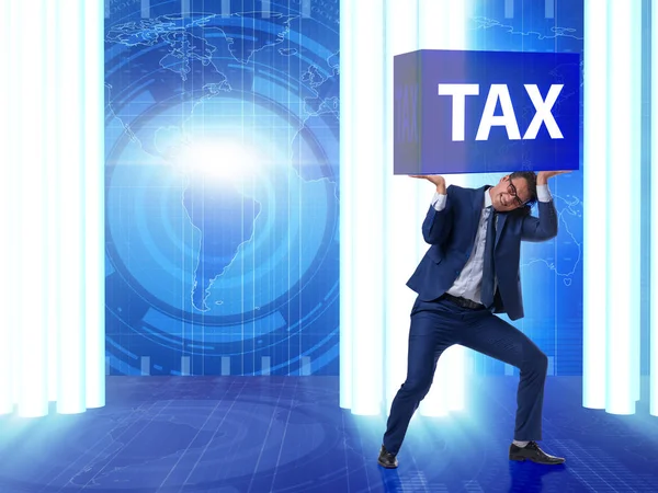 Man under the burden of tax payments — Stock Photo, Image