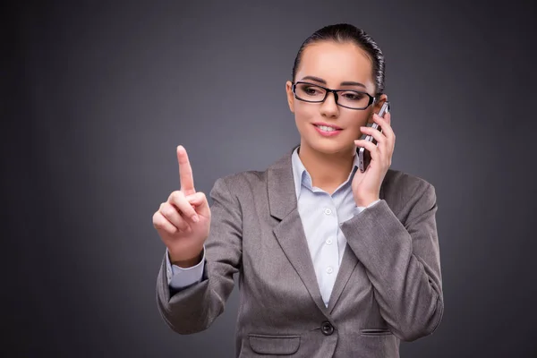Businesswoman using mobile phone in business concept — Stock Photo, Image