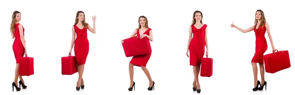 Young woman in red dress with suitcase isolated on white — Stock Photo, Image