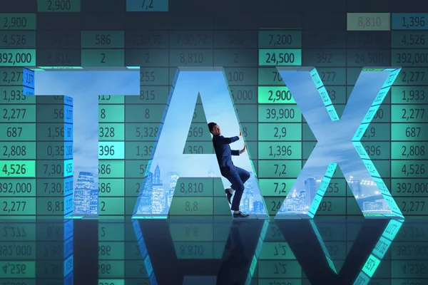 Empresário no conceito de altos impostos — Fotografia de Stock