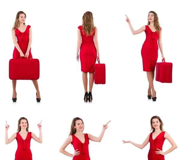 Jeune femme en robe rouge avec valise isolée sur blanc — Photo