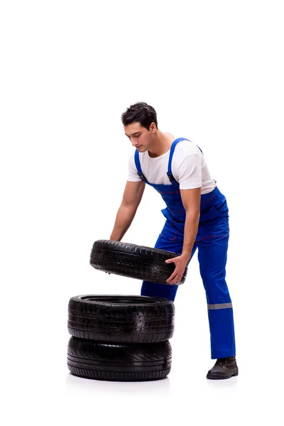 Reparador de neumáticos guapo aislado en blanco —  Fotos de Stock
