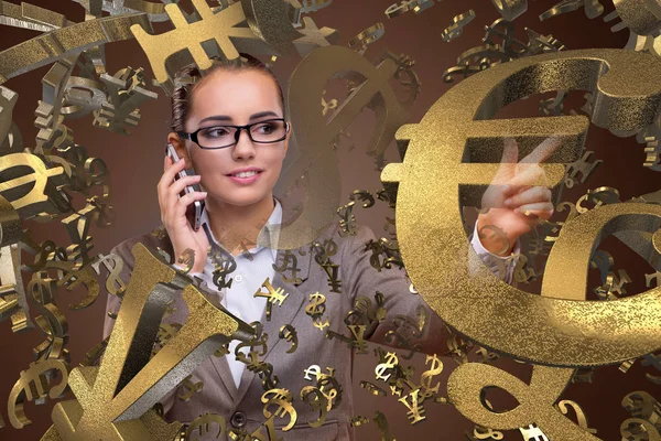 Businesswoman with currencies in business concept — Stock Photo, Image