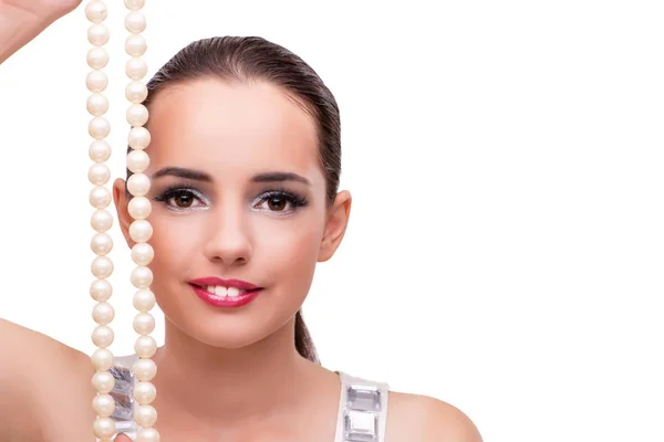 Mujer joven mostrando sus joyas aisladas en blanco — Foto de Stock