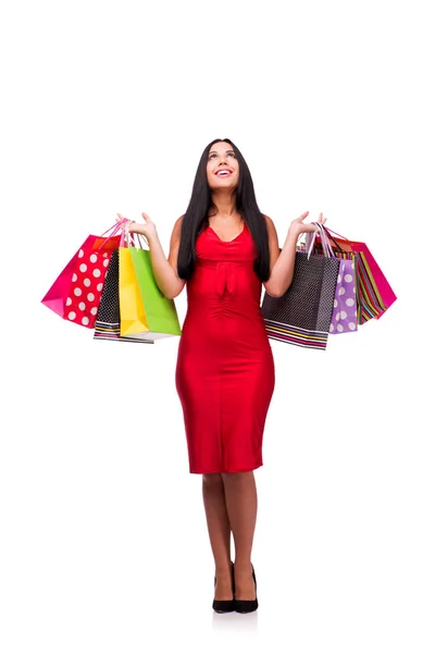 Donna in draghe rosse dopo lo shopping isolato su bianco — Foto Stock