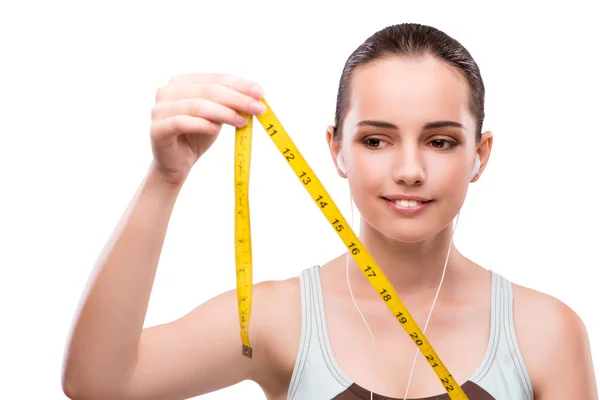 Mujer joven con centímetro en concepto de dieta —  Fotos de Stock