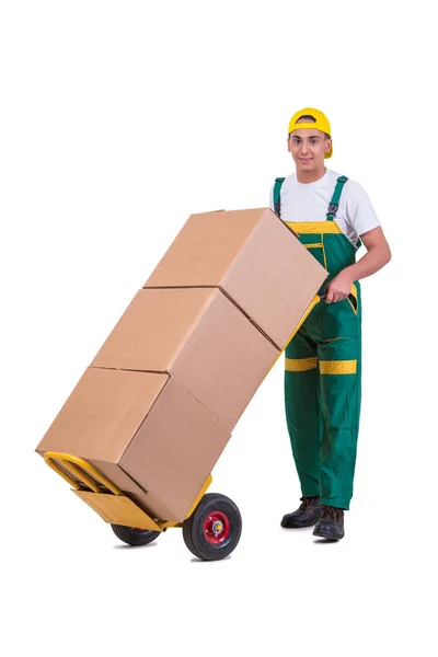 Hombre joven moviendo cajas con carro aislado en blanco — Foto de Stock