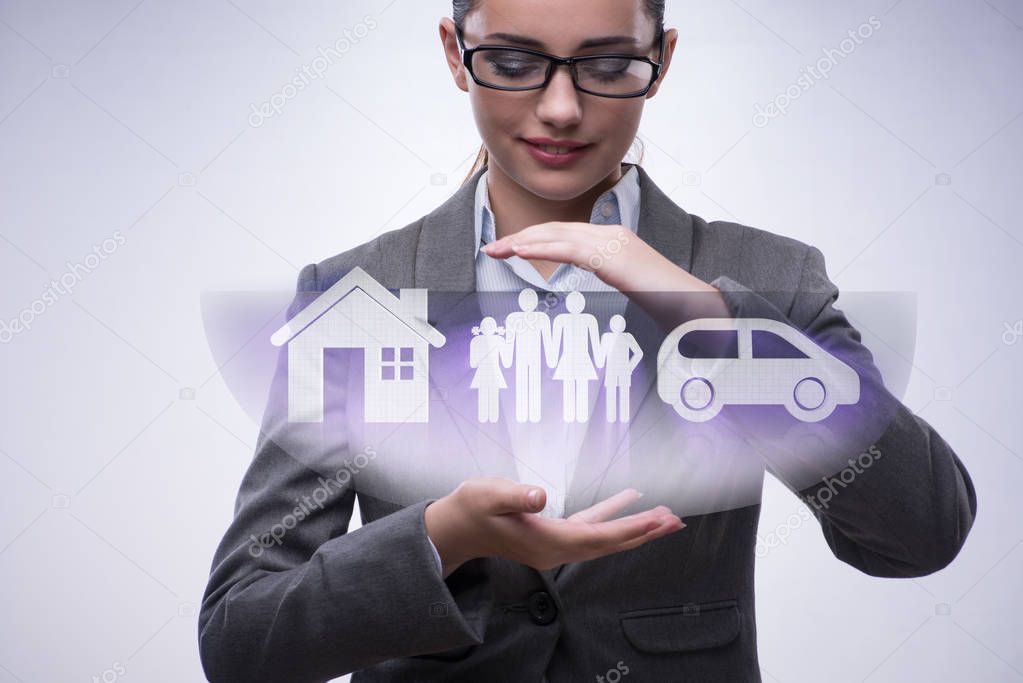 Young businesswoman in insurance concept