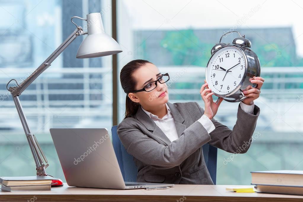 Businesswoman failing to meet her deadlines in business concept