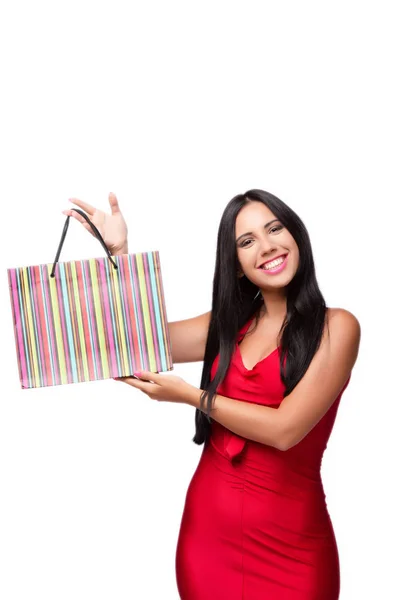 Woman in red dres after shopping isolated on white — Stock Photo, Image