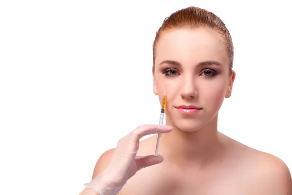 Молода жінка готується до лікування обличчя ізольована на білому — стокове фото