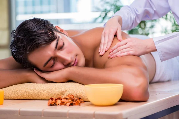 Man during massage session in spa salon — Stock Photo, Image