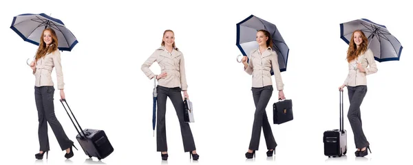 Young woman travelling with suitcase and umbrella isolated on wh — Stock Photo, Image