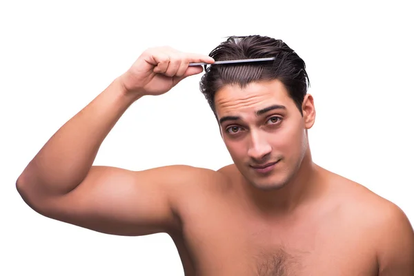 Man doing his hair isolated on white — Stock Photo, Image