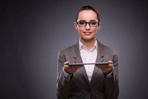 Young woman with tablet in business concept — Stock Photo, Image