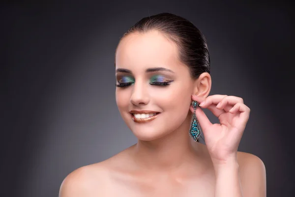 Beautiful woman showing off her jewellery in fashion concept — Stock Photo, Image