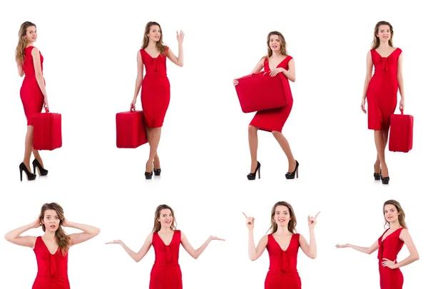 Young woman in red dress with suitcase isolated on white — Stock Photo, Image