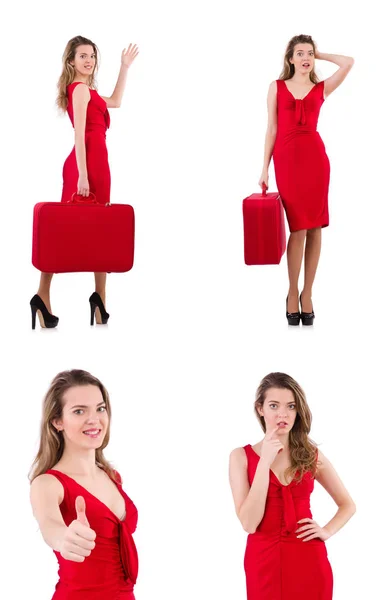 Mujer joven en vestido rojo con maleta aislada en blanco — Foto de Stock