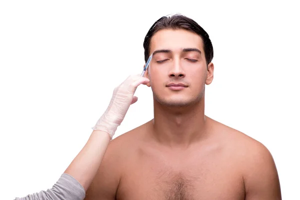 Man undergoing plastic surgery isolated on white — Stock Photo, Image