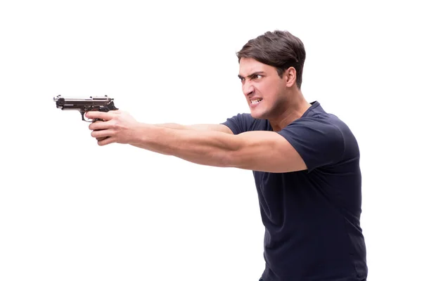 Agressieve jonge man met een pistool op wit wordt geïsoleerd — Stockfoto