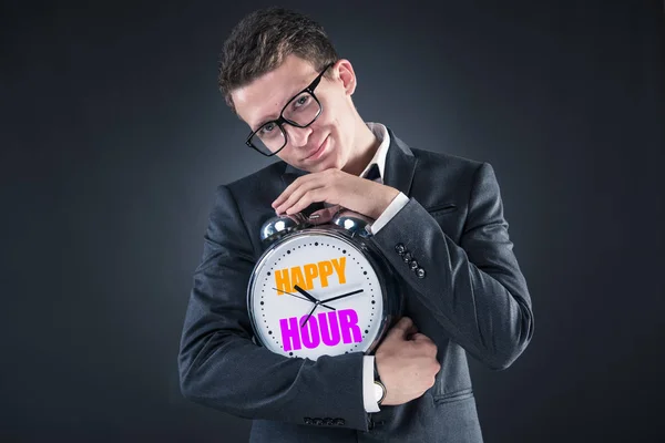 Businessman in happy hour concept — Stock Photo, Image