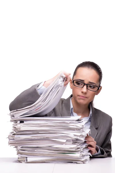 Mulher irritada com pilhas de papel em branco — Fotografia de Stock