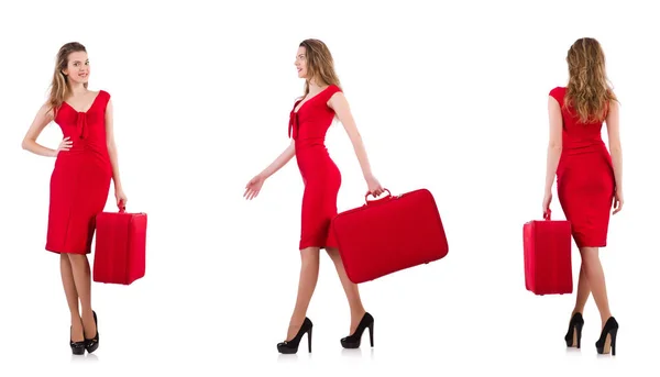 Jeune femme en robe rouge avec valise isolée sur blanc — Photo