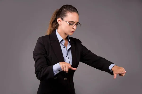 Young woman businesswoman pressing virtual buttons — Stock Photo, Image