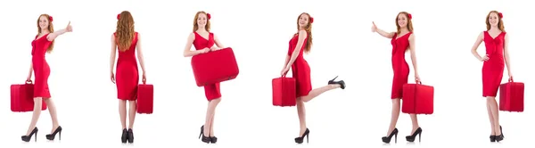 Young woman in red dress with suitcase isolated on white — Stock Photo, Image