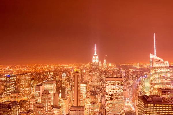 Nachtzicht van New York Manhattan tijdens zonsondergang — Stockfoto