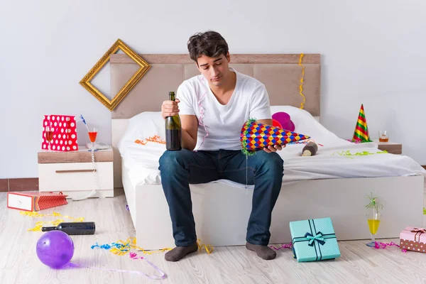 Man after heavy christmas partying at home