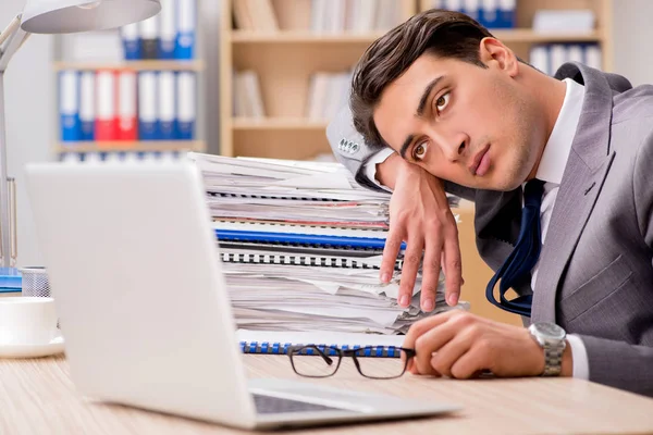 Businessman tired sitting in the office — Stock Photo, Image