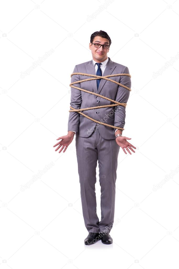 Businessman tied up with rope isolated on white