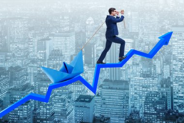 Tekne Çizgi grafiğinin üzerine çekerek işadamı