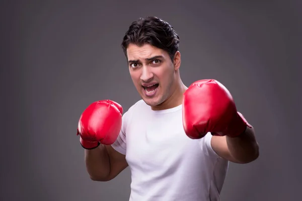 Boxer bonito no conceito de boxe — Fotografia de Stock