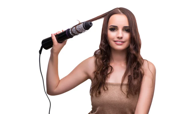 Jovem mulher bonita com secador de cabelo isolado no branco — Fotografia de Stock