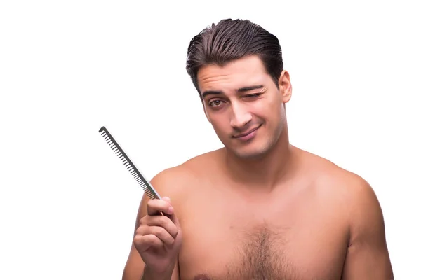 Чоловік чистить волосся ізольовано на білому — стокове фото