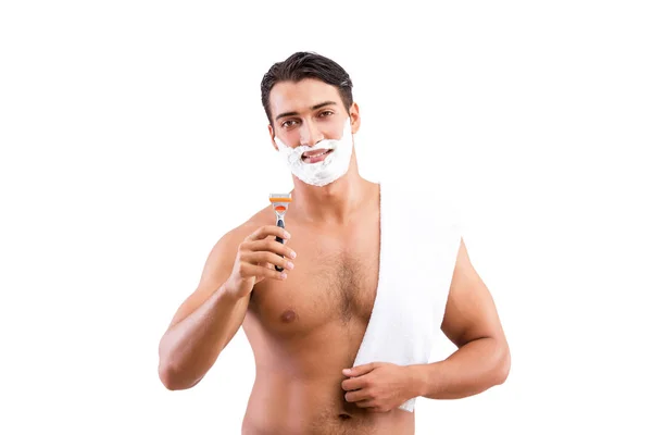 Yakışıklı adam, beyazın üzerinde tek başına tıraş oluyor. — Stok fotoğraf