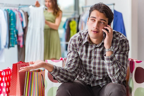 Man fed up with wife shopping in shop