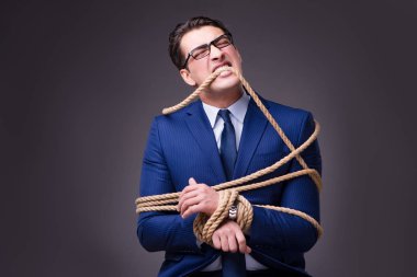 iple bağlanmış iş adamı