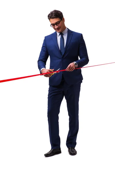 Businessman cutting red ribbon isolated on white — Stock Photo, Image