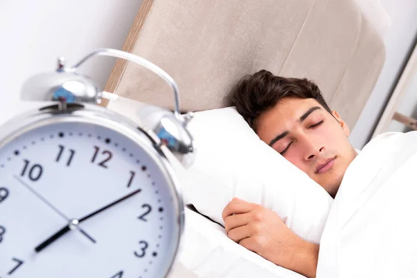 Young man having trouble waking up in the morning — Stock Photo, Image