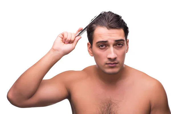 Adam beyaz izole saçları fırçalama — Stok fotoğraf