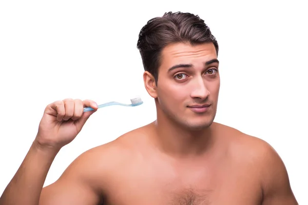 Чоловік чистить зуби ізольовано на білому — стокове фото