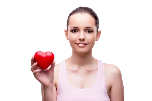 Giovane donna con cuore rosso isolato su bianco — Foto Stock