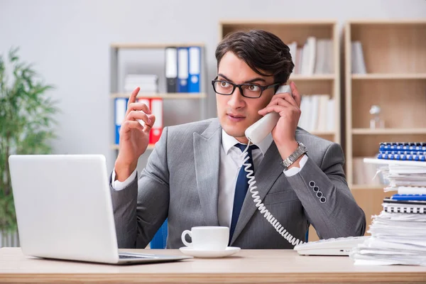 Handsome businessman working in the office — Stock Photo, Image